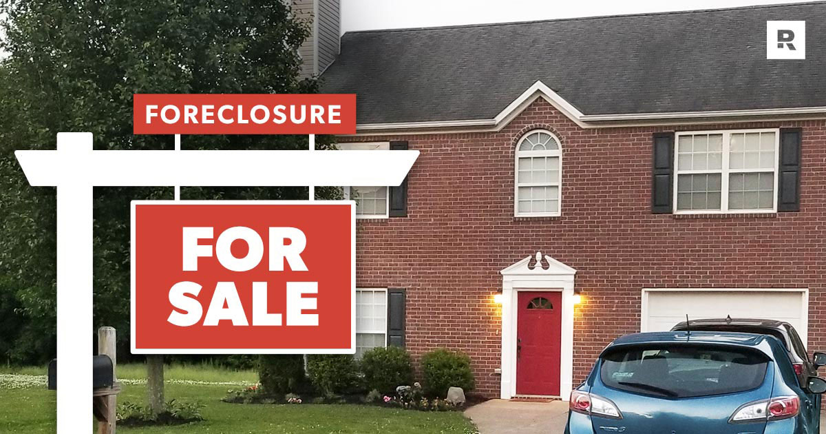 Foreclosure with For Sale sign