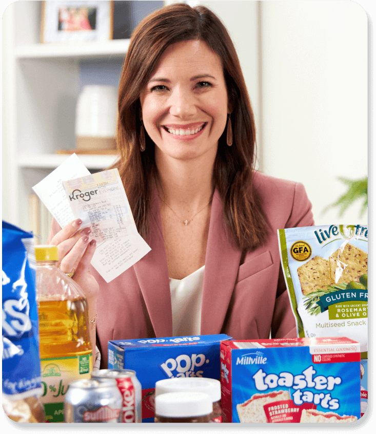 Rachel Cruze holding a receipt for Grocery Savings Guide